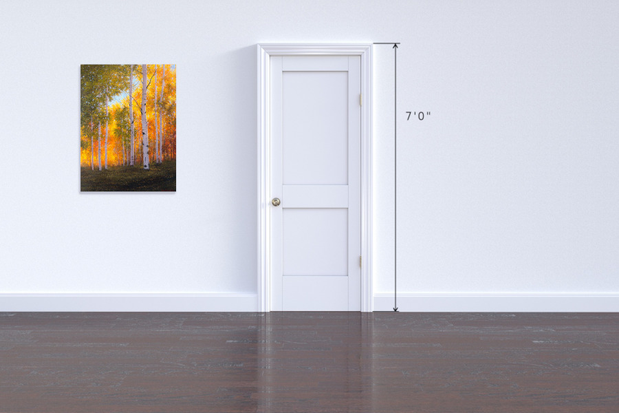 Fall aspens with sunshine in the background