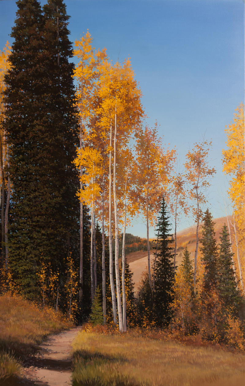 Autumn pathway into the aspens and pines