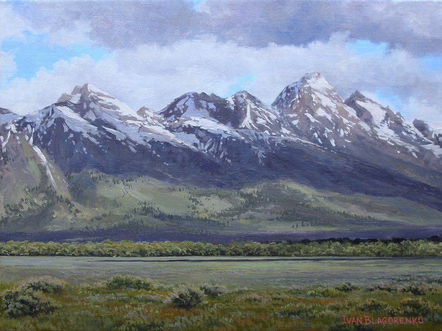 Grand Tetons with clouds above