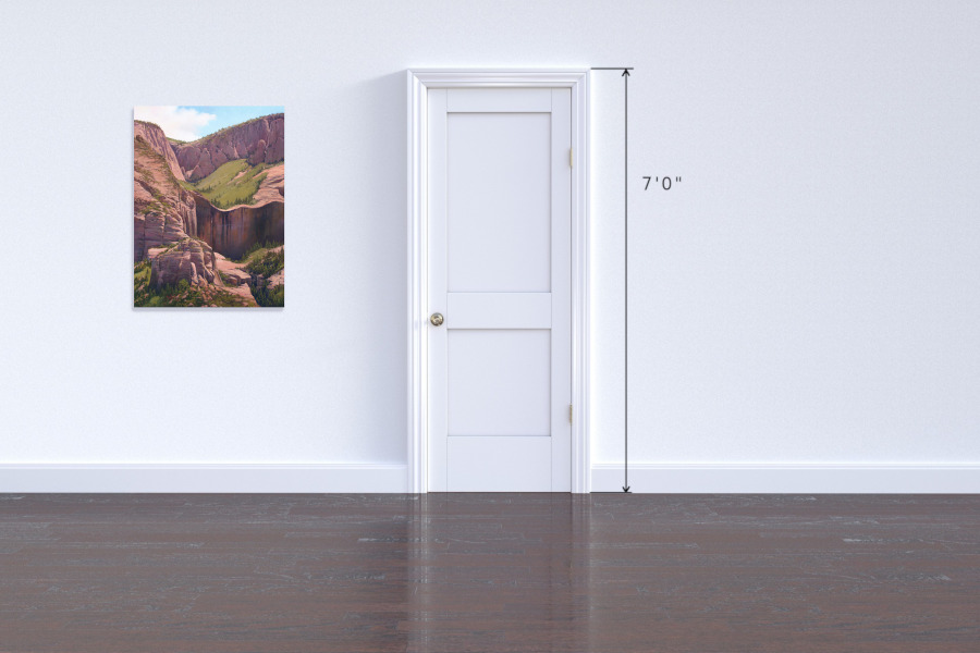 Red rock mountain vertical drop with sunshine